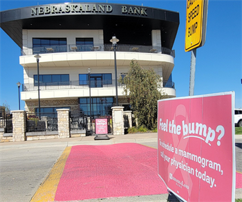 Painting Our Speed Bump Pink for Breast Cancer Awareness Month