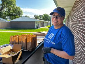 Carol with Meals on Wheels lunchs