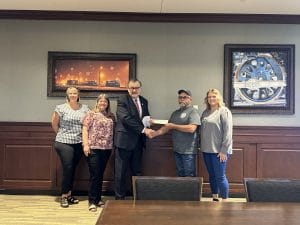 Brady Volunteer Fire Department receiving donation check.