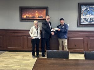Maxwell volunteer volunteer fire department receiving donation check.