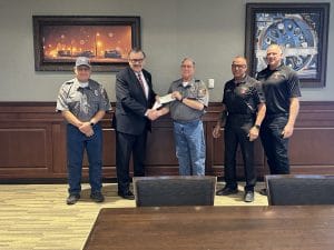 North Platte volunteer fire department receiving donation check.