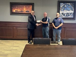 Wallace volunteer fire department receiving donation check.